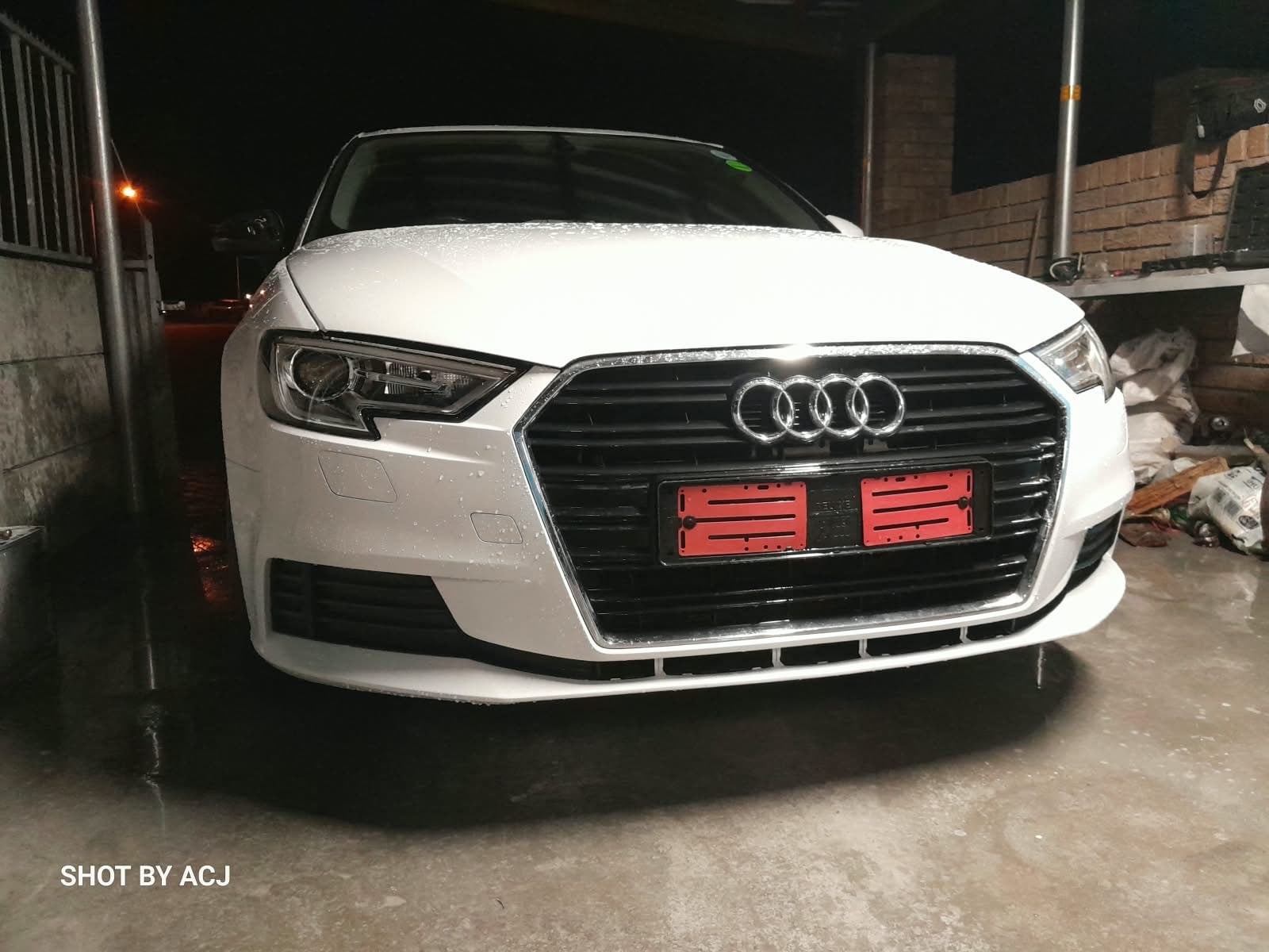 White Audi completed front finish after ACJ spraypainting